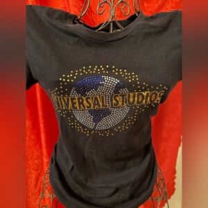 Universal Black Tee with Gold and Blue Accents